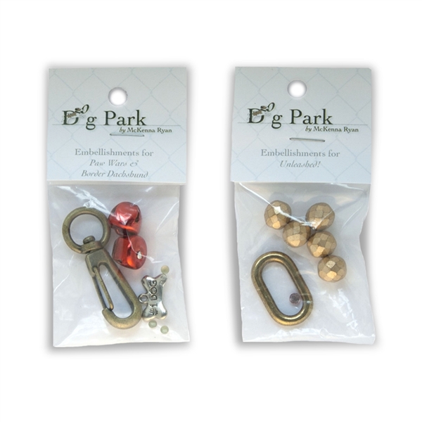 Both embellishment kits contain different beads and dog tag hardware