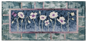 Quilt block of a field of poppy flowers