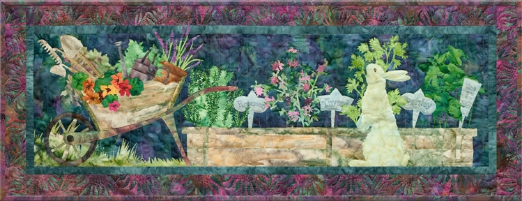Quilt block of a rabbit named Stu tending to his garden, where he is growing rosemary, thyme, parsley, and basil, and his wheelbarrow piled high with his supplies and the flowers he's ready to plant.