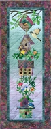 Quilt block of six linked birdhouses, and a group of happy birds.