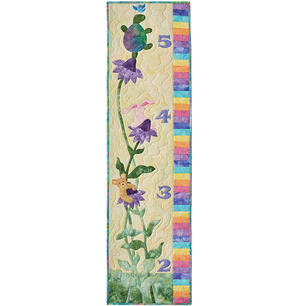 Watch your little one grow with this darling growth chart, featuring flowers with a bear, bunny and turtle.