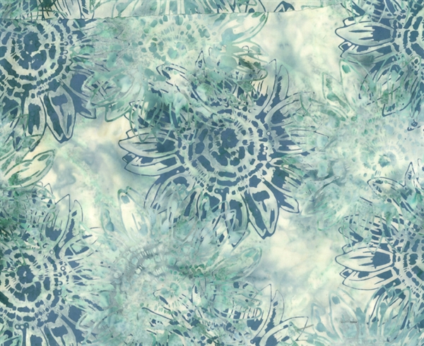 Batik fabric print of sunflowers in light turquoise, sea-glass green and dusty blue.