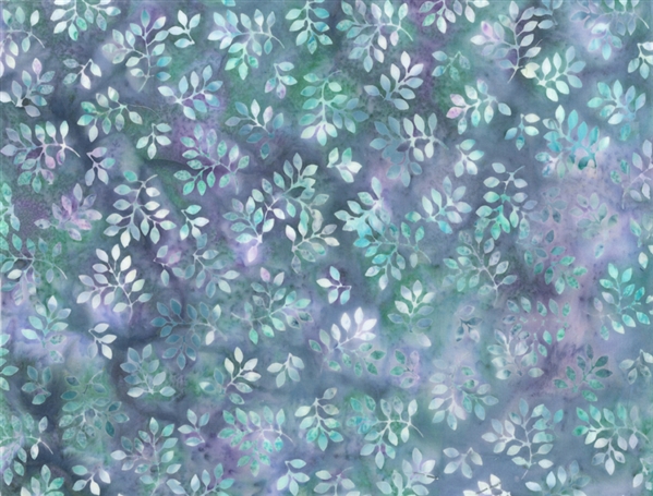 Batik fabric print of tiny leaves in shades of green and purple.