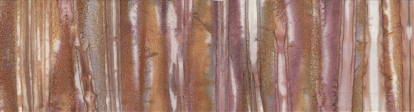 Batik fabric print in brushstroke design in tones of rust red brown