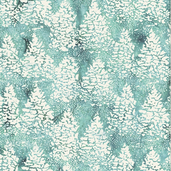 Batik fabric in snowy tree print in mint green tones