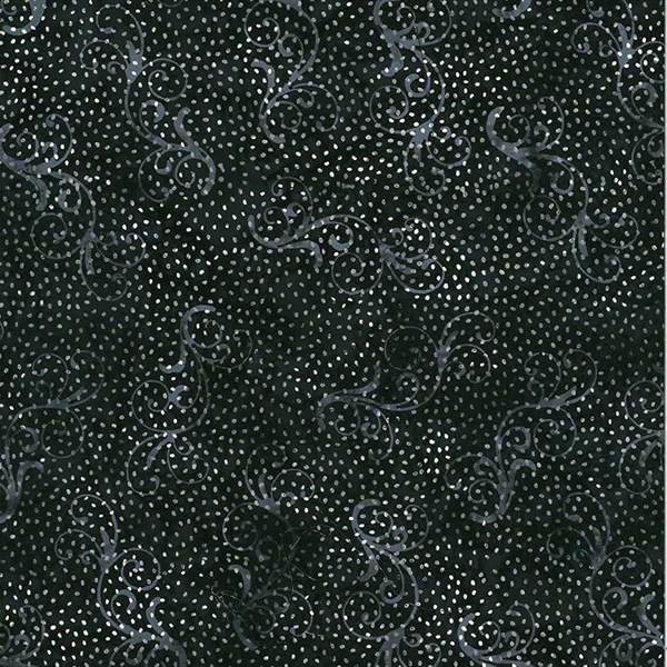 Batik fabric in a swirly, snow flurry print in dark gray and black tones