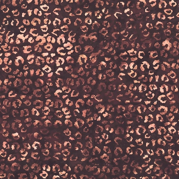 Batik fabric in leopard print in burgundy with pale peach undertones