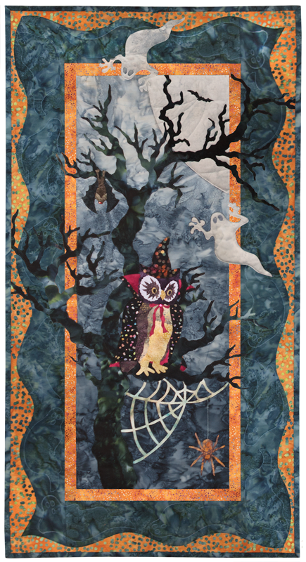 Owl, dressed up as wizard, perched on spooky tree with spider and bat.