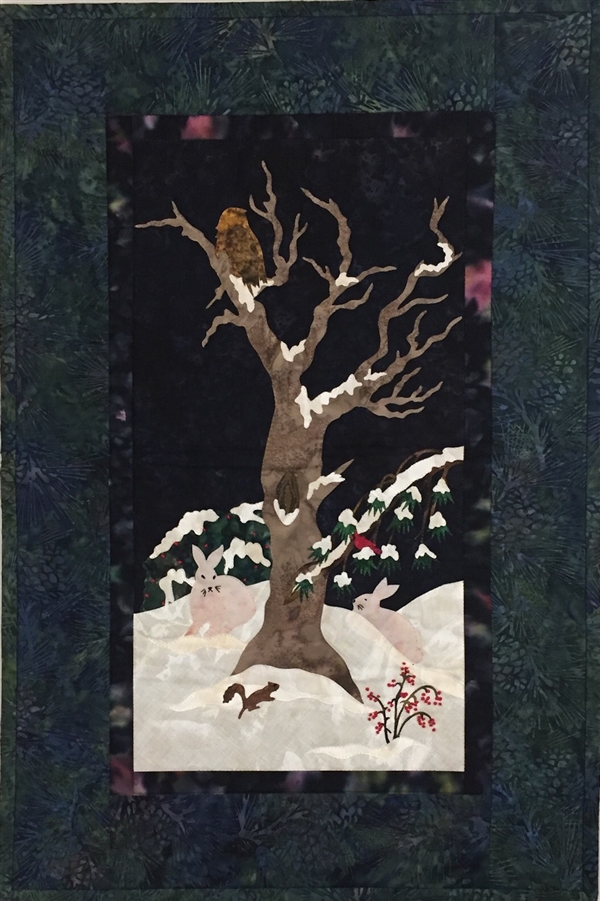 An owl, a squirrel, and a pair of bunnies spend a snowy night in the old tree.