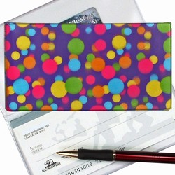 Lenticular checkbook cover with pink, yellow, blue, and green balls on a purple background, depth