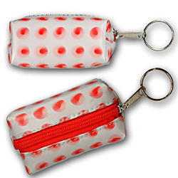 Lenticular purse key chain with red circles spin around on a white background, animation