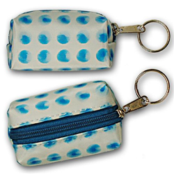 Lenticular purse key chain with blue circles spin around on a white background, animation