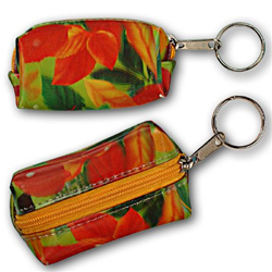 Lenticular purse key chain with large spring time red and orange flowers, depth