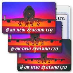 Lenticular luggage tag with jumbo jet airplane taking off in the sunset from an international airport, animation