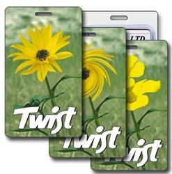 Lenticular luggage tag with yellow flower in a green field Printing