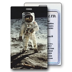 Lenticular luggage tag with NASA explorer astronaut stands on grey dusty Moon in outer space, depth