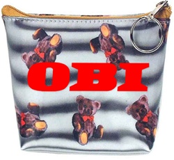 Lenticular zipper purse with teddy bears on a black and white striped background, depth