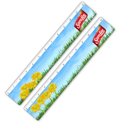 Lenticular ruler with growing bright yellow flowers in a grassy spring field in clear blue skies, animation