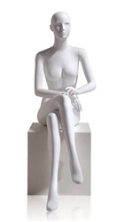 Female Abstract Egghead Mannequin in Matte White with arms in lap in a seated pose