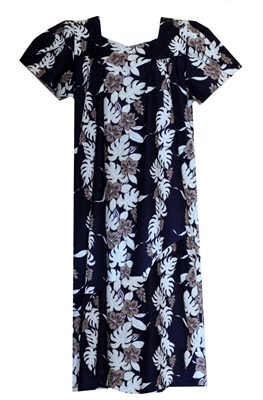 â€‹Black mid-calf Hawaiian muumuu with 7 panels of flowers and monstera leaf.