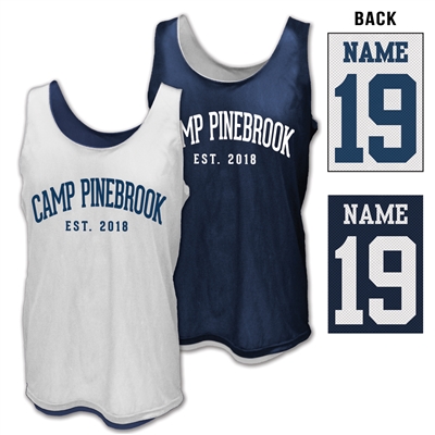 Reversible mesh tank top made of 100%  polyester.Printed with Camp Pinebrook wordmark.