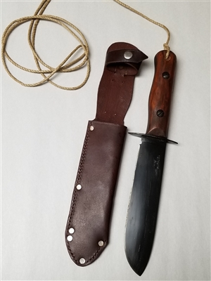 BRITISH ARMY SURVIVAL KNIFE WITH LEATHER SCABBARD.