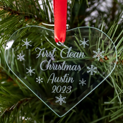 The 2023 - First Clean Christmas- Recovery Ornament featuring snowflakes and a personalized message that includes your name, the date, and First Clean Christmas.
