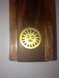 Traditional Wooden Stick Incense Burner with a brass inlay of the SUN