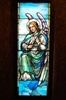 Angel with Lilly Flower, Antique Stained Glass Window By J&R Lamb Studios.