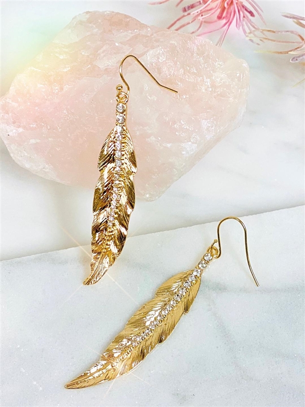 Pave leaf drop earring on white background