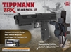 A Tippmann TiPX deluxe paintball pistol kit. The kit includes a black TiPX marker, a leg holster, and three 7-round true feed magazines.