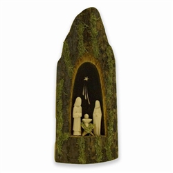 The artist takes a one inch vertical slab of tapered linden tree and carves a niche out of the bark side in order to fit a miniature Holy Family. Decorated with moss these rustic creches reflect the spiritual nature of the Polish countryside. No two crech