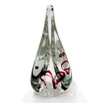 Three-sided art glass paperweight, with a frosted base with cranberry ribbon and a few bubbles, in a classic teardrop shape.  Each piece is hand blown and hand finished in Poland.  Made with the highest quality craftsmanship and hand-signed by the artist