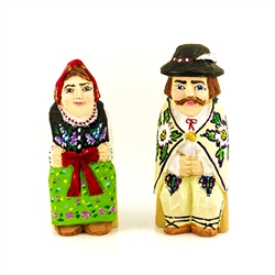 Hand carved and painted in Poland. Note that the back of his white cloak has a little red paint smudge from his partners babushka.