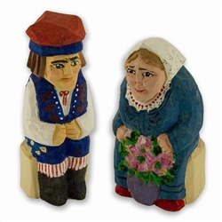 Hand carved and painted in Poland by folk artist Tadeusz Lesniak. Each pair is hand made so no two are exactly alike.