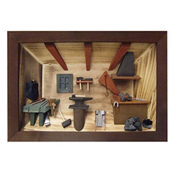 Poland has a long history of craftsmen working with wood in southern Poland. Their workshops produce beautiful hand made boxes, plates and carvings.  This shadow box is a look inside a traditional Polish blacksmith's workshop. Note the attention to detail