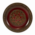 Polish wooden plates are made from Linden wood in the mountain region of southern Poland called Podhale.  The plates are cut and shaped on a lathe by hand.  The floral designs are burned into the wood then painted after staining and varnishing.