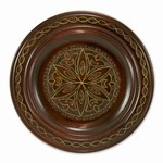 Hand Made in Southern Poland Polish wooden plates are made from Linden wood in the mountain region of southern Poland called Podhale. The plates are cut and shaped on a lathe by hand. The floral designs are burned into the wood then painted after staining