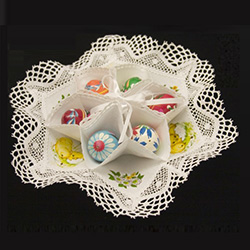 Pisanki Easter Egg Holder And Centerpiece, the perfect way to display your Easter eggs or pisanki.  Displays six chicken size eggs in the center and another six around the outside.  Eggs not included.