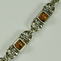 Square amber stones set in sterling silver.  Size is approx 7.5" x 0.25".