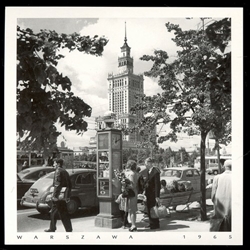 Palac Kultury i Nauki - The Palace of Culture and Science in the background is still here.  The PKO street display and clock does however reflect the look of a typical main street in Warsaw in 1965.  Historical Black and White Photo Postcard