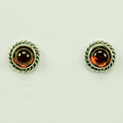 Baltic Amber stud earrings with Sterling Silver spiraling rope detail. Size is approx .25" diameter