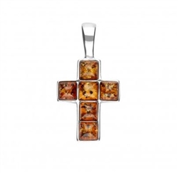 This petite amber and sterling silver cross  is approx. 1' x 0.6"