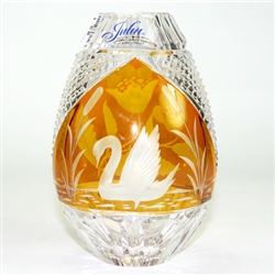 Amber colored cased crystal is a Polish specialty.  Hand blown, cut and polished from the "Julia" factory in Poland
This is genuine Polish hand-cut leaded crystal with a swan and floral design.