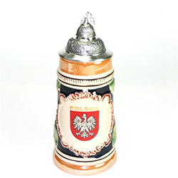 This is a very handsome beer stein! What a great gift for any occasion! The Polish Eagle is proudly displayed in a crest with POLSKA (POLAND) in gold letters.  This beautiful stein is hand made and painted.  It also features scenes from the Polish Tatra m