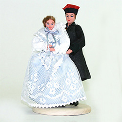 The Zywiec couple come from the town with the same name in the mountain region of southern Poland. The woman's dress comes in a variety of colors. Blue is in the picture.