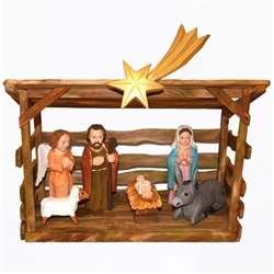 The Holy Family and in particular the Nativity is a popular theme in Polish folk art. Mr Wolinski's carvings are very colorful and precise. They are all separate and can be moved as you like.