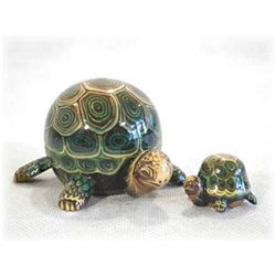 Here is a cute pair of happy-go-lucky nesting turtles.  These animals have been a best seller for ages.  Hand painted in St. Petersburg Russia.