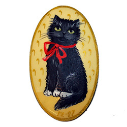 Beautiful handmade Russian lacquerware brooch with a handpainted black cat against a tan background.