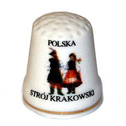 This porcelain thimble has a dancing couple from Krakow.  Beautiful collector's item.